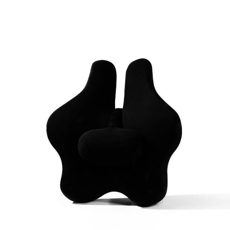 Memory foam car lumbar support cushion in solid colour on a car seat.