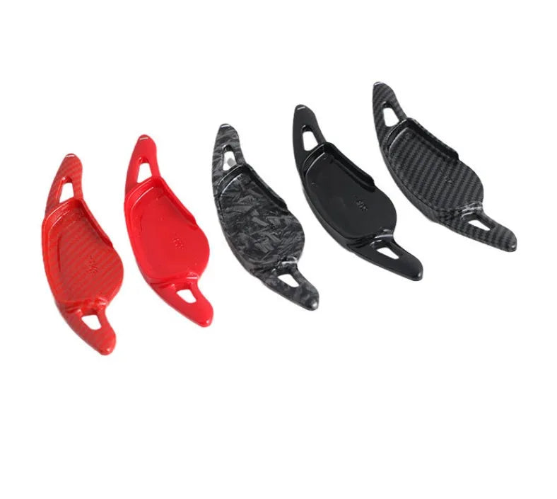 Carbon fibre pattern steering wheel paddle shift modification kit for car interior.