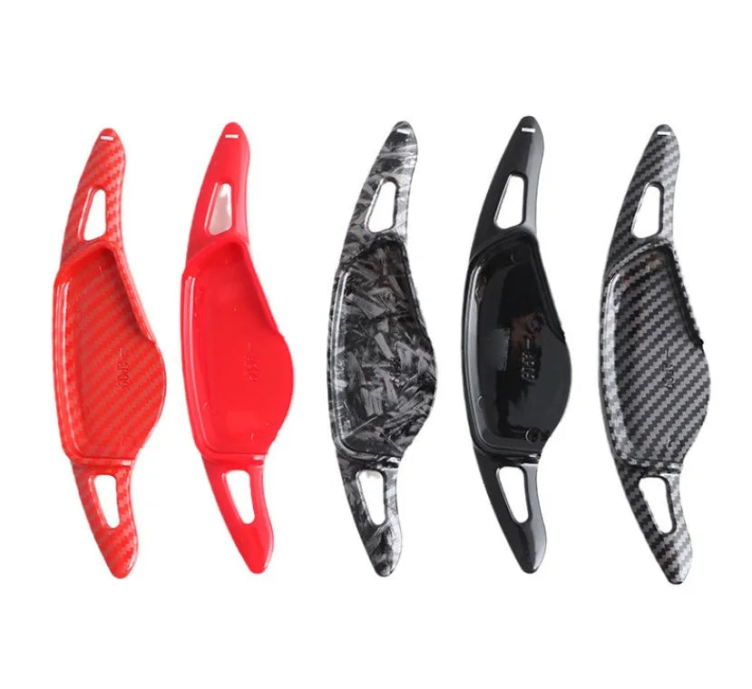 Carbon fibre pattern steering wheel paddle shift modification kit for car interior.
