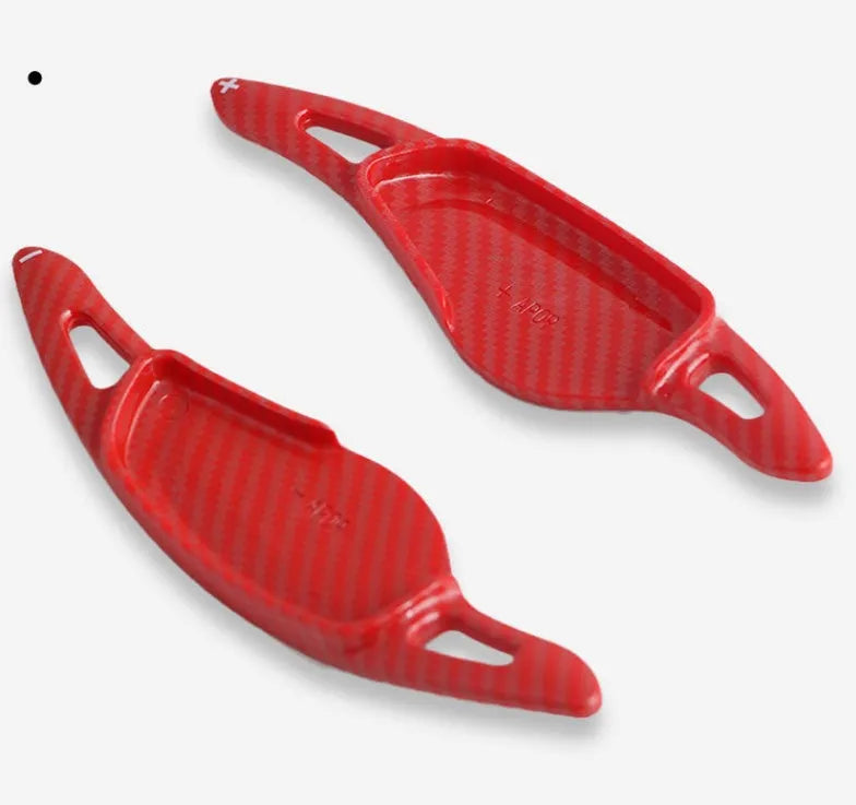 Carbon fibre pattern steering wheel paddle shift modification kit for car interior.