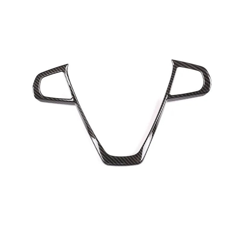BMW steering wheel button frame decoration with carbon fibre pattern on black ABS.