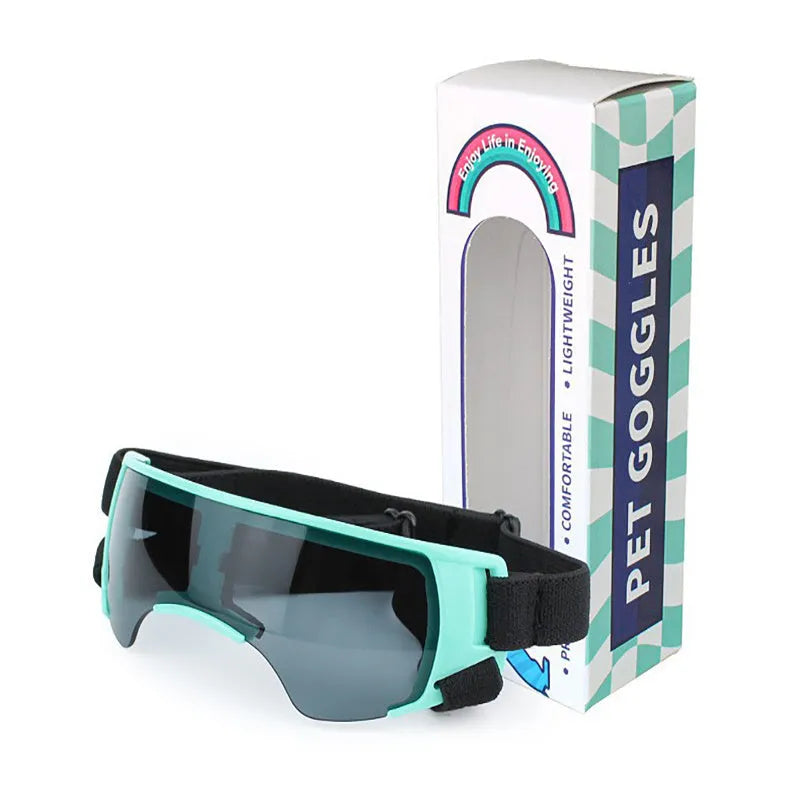 Dog UV-proof goggles with PC lens and adjustable nylon strap in black colour on a plain background
