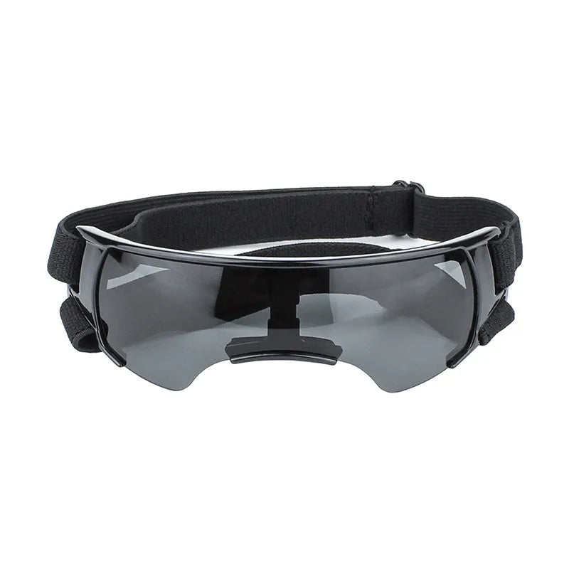 Dog UV-proof goggles with PC lens and adjustable nylon strap in black colour on a plain background