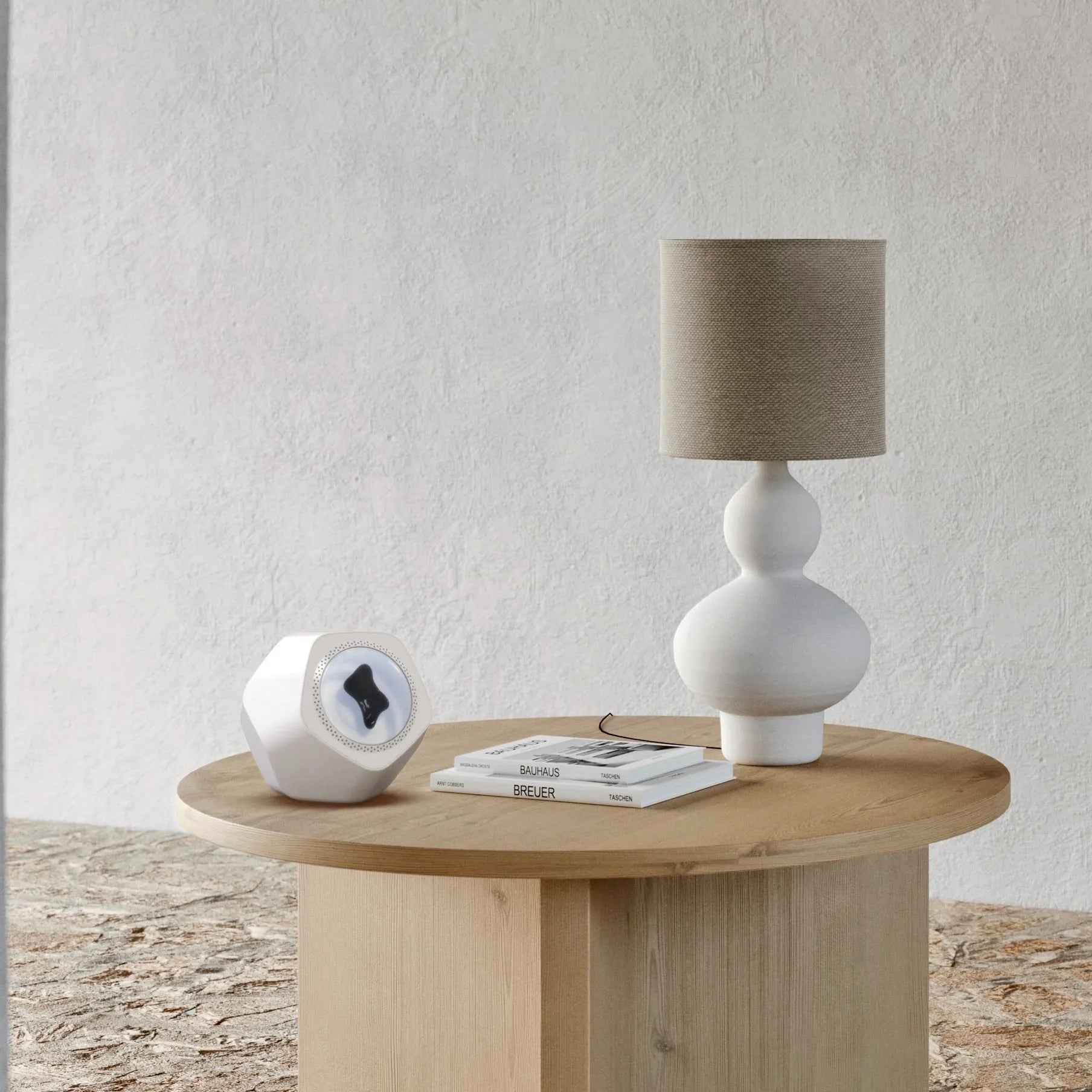 Floating magnetic fluid Bluetooth speaker in black showing fluid spikes, on a desk, with compact 137mm dimensions