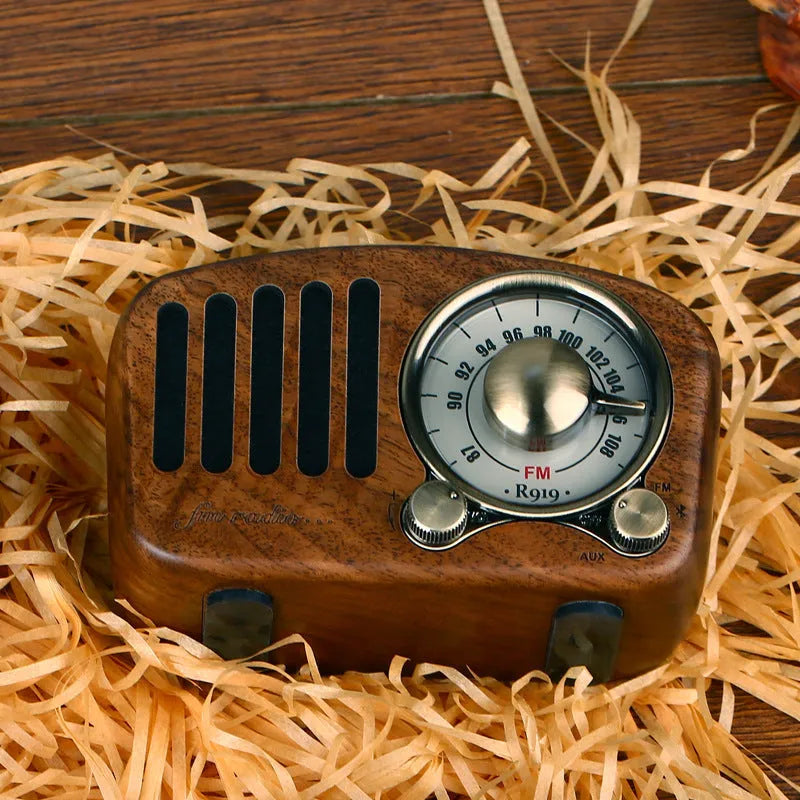 Retro wooden wireless mini speaker in cherry wood finish showing compact dimensions