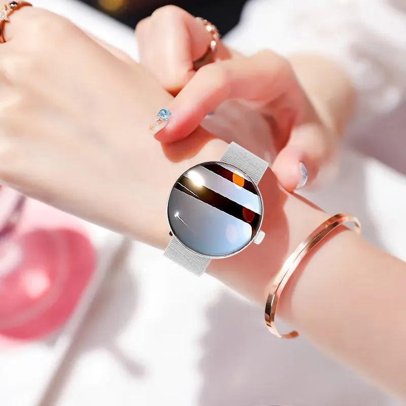 Women's smart watch with circular colour touchscreen and metal wrist strap in black, gold or silver steel