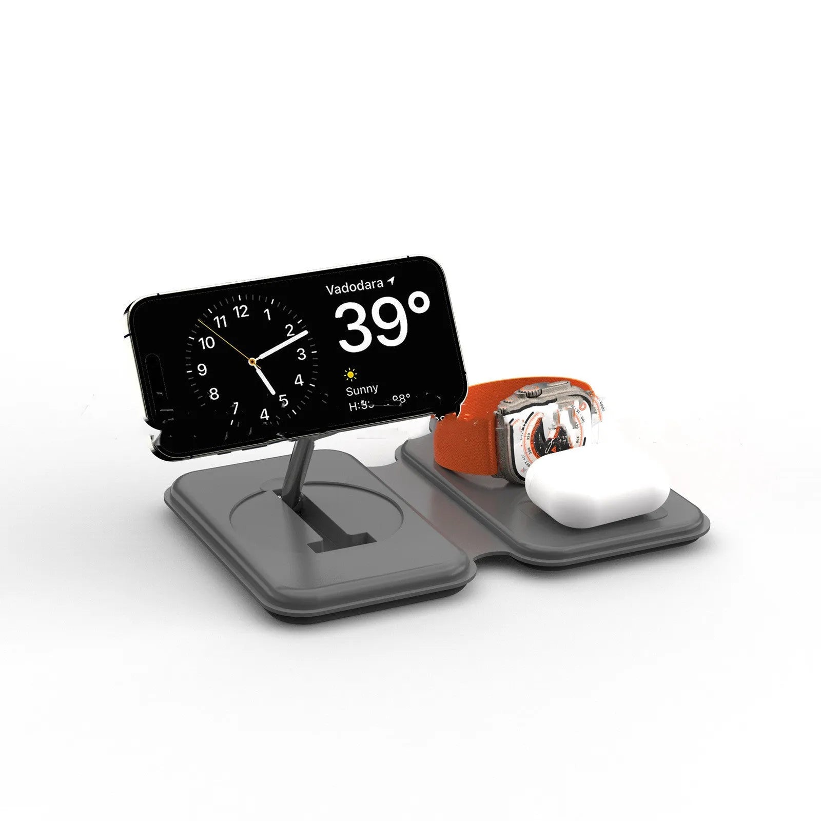 Folding magnetic three-in-one wireless charger in black with phone, watch, and earbuds on a desktop