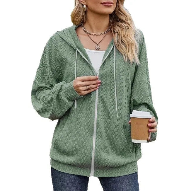 Green women's hooded zip-front sweater coat with loose fit and long sleeves.