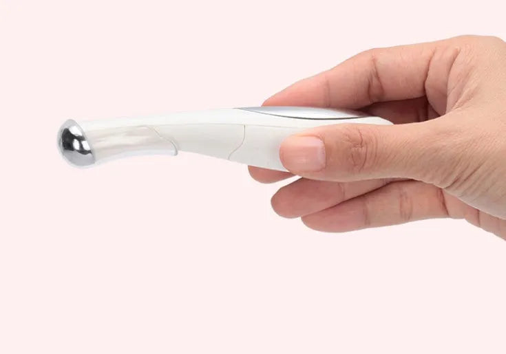 Eye massager beauty pen in white with single gear and battery included for home eye care