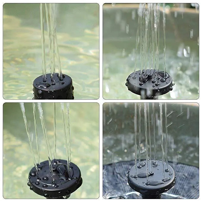 Solar floating fountain with round black panel and four spray nozzles on water surface