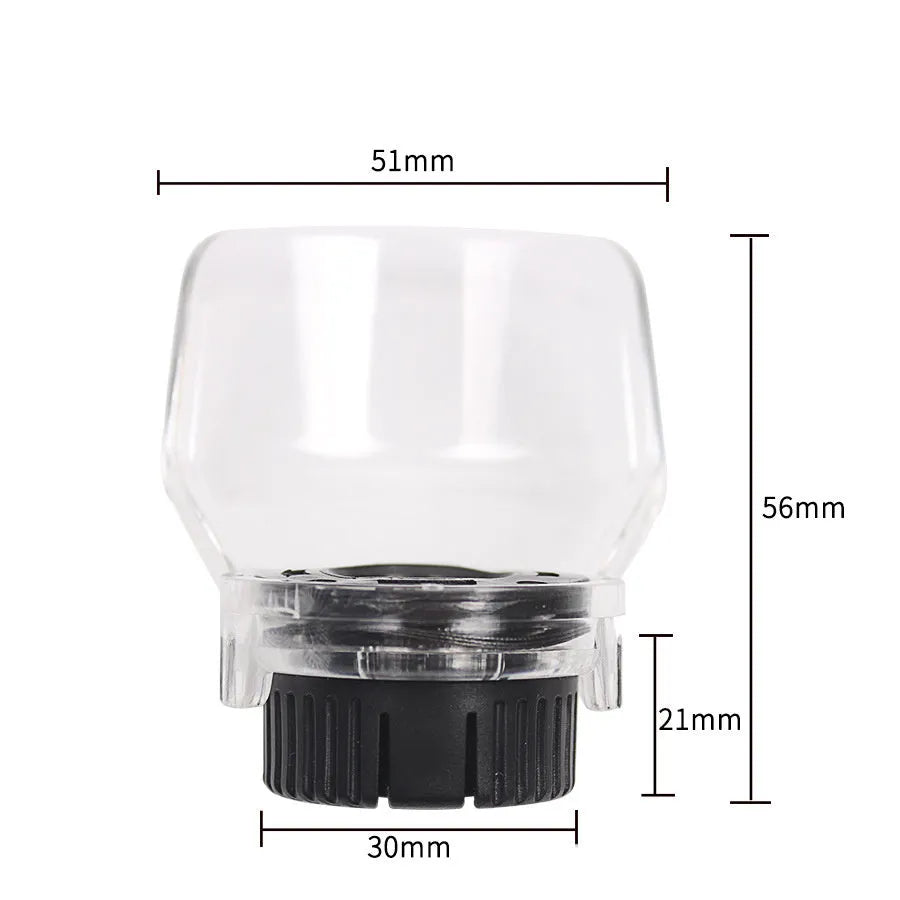 Clear plastic protective face shield for Delta electric grinders on a workbench.