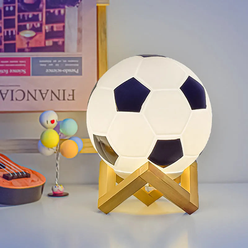 Football LED small glass night lamp with black and white football design on bedside table, USB powered, remote controlled