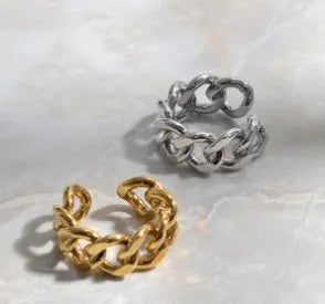 Golden aluminium alloy adjustable geometric ring chain on white background