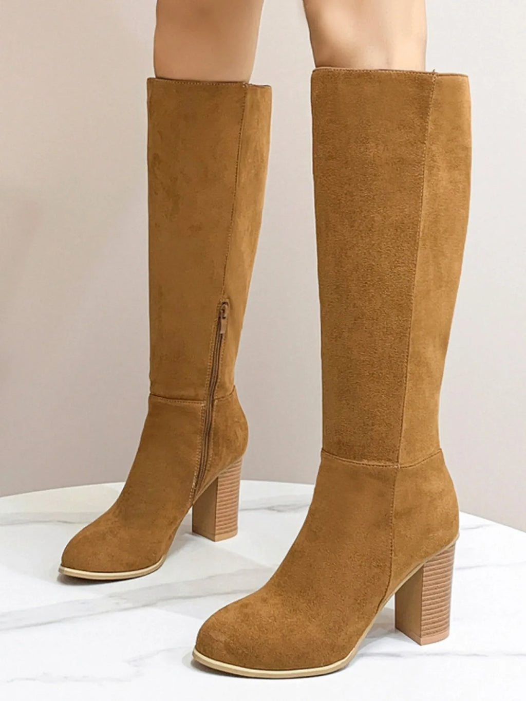 Women's square toe high heel boots in black or dark brown, showing artificial PU upper construction