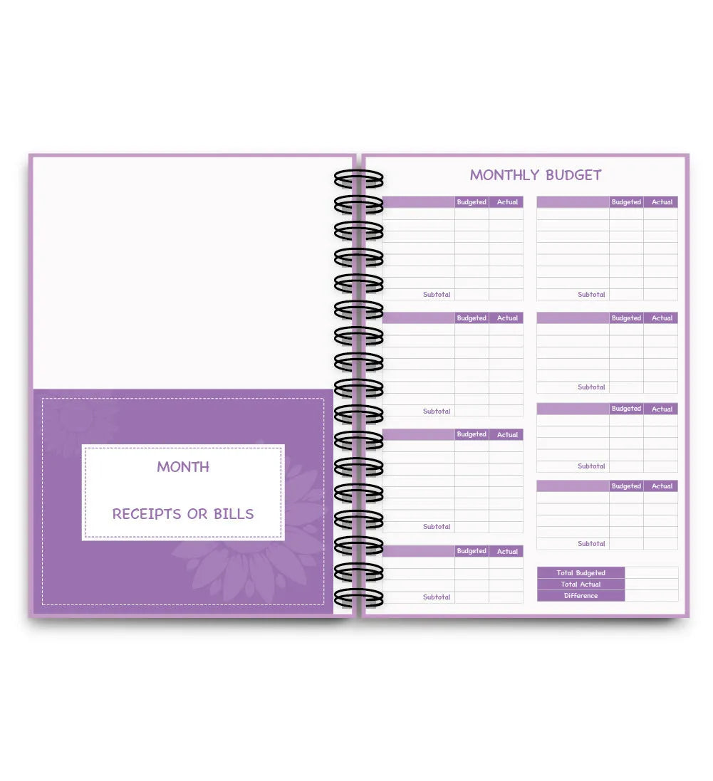 Purple coil-bound financial planning notebook with stickers, pen, and paper clips for monthly budget tracking