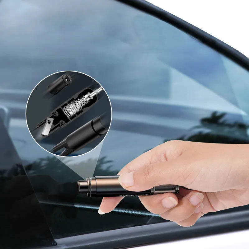 Black and red car emergency window breaker and seat belt cutter tool with mounting bracket on a grey background.