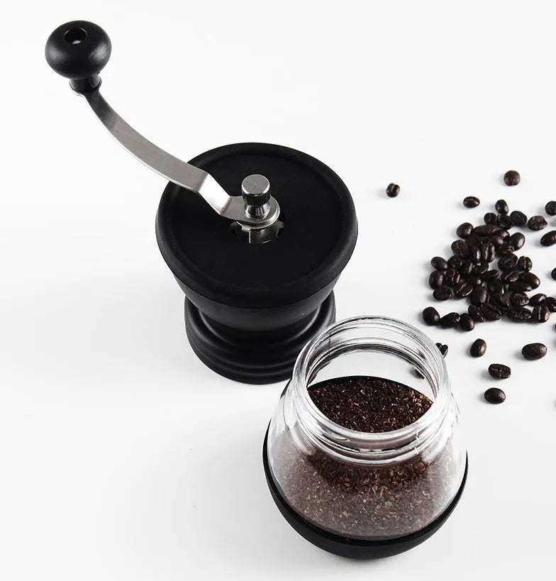 Hand grinder coffee machine with beech wood body and black finish on a countertop, width 88mm