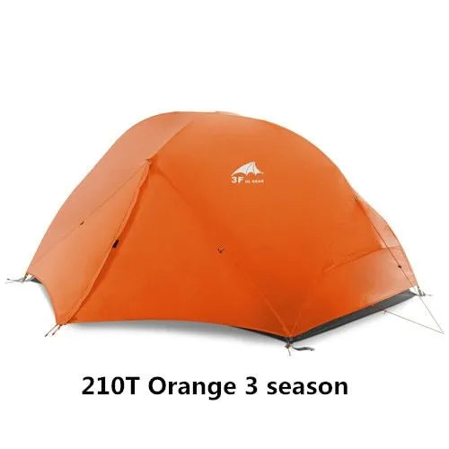 Orange Cloud2 lightweight double tent pitched outdoors with aluminium poles and flysheet