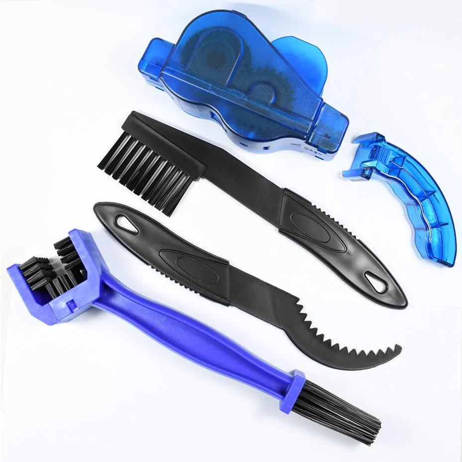 Blue plastic bicycle chain cleaning washer set with brushes on a bike chain