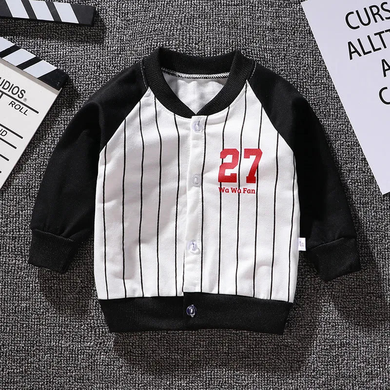 Children's Korean baseball jacket in beige with animal print, V-neck, long sleeves, non-hooded, on child.