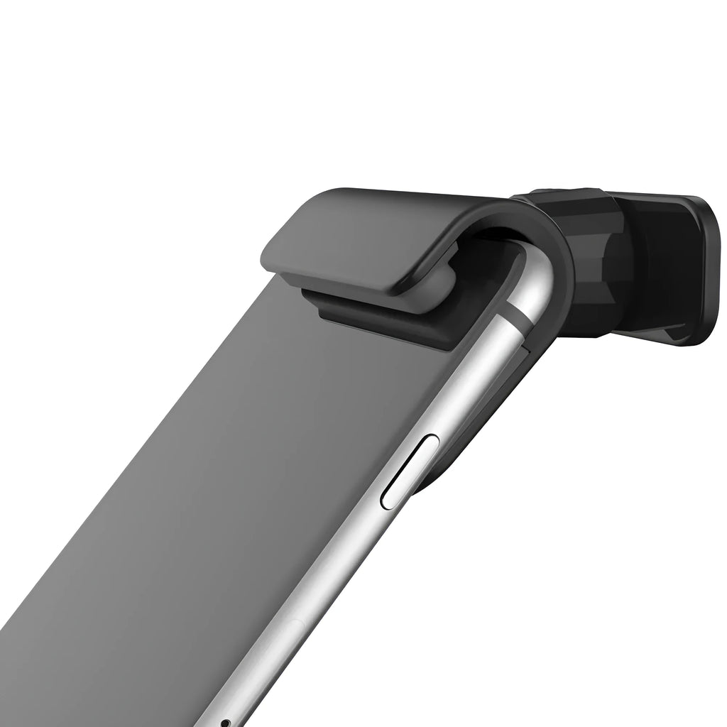 Black gravity car phone holder with 360-degree rotation mounted on a car dashboard.