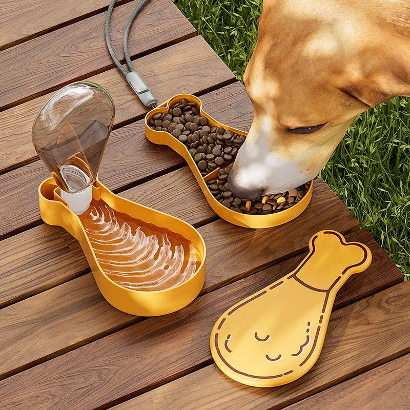 Orange and white portable pet water bottle with attached food container for travel