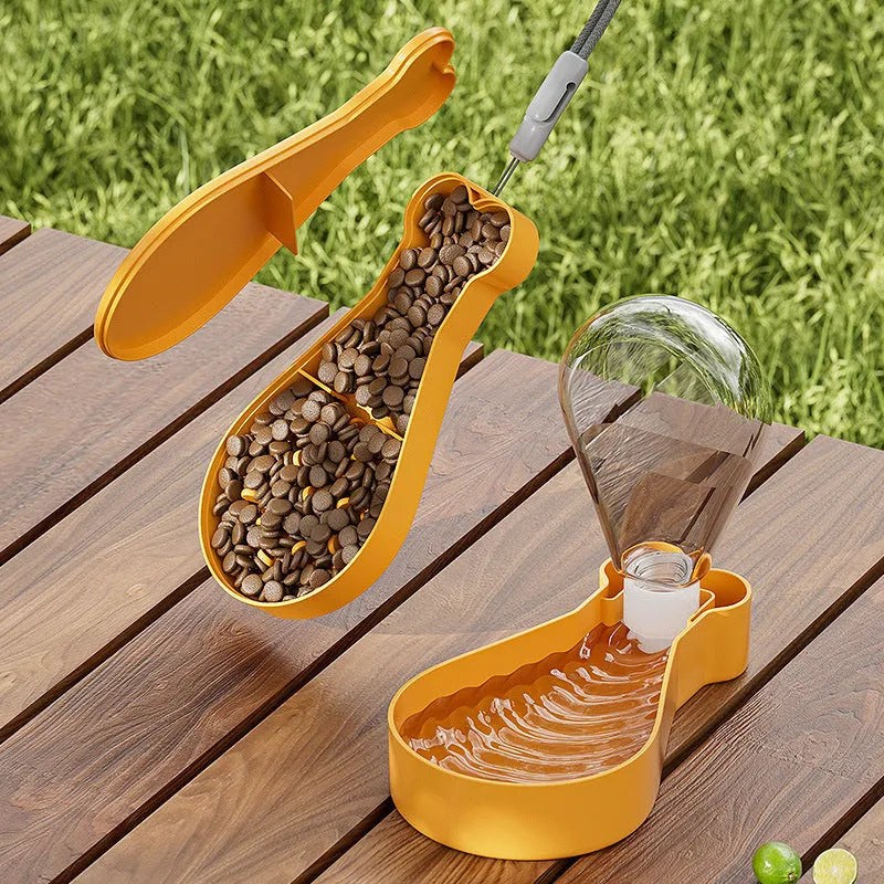 Orange and white portable pet water bottle with attached food container for travel