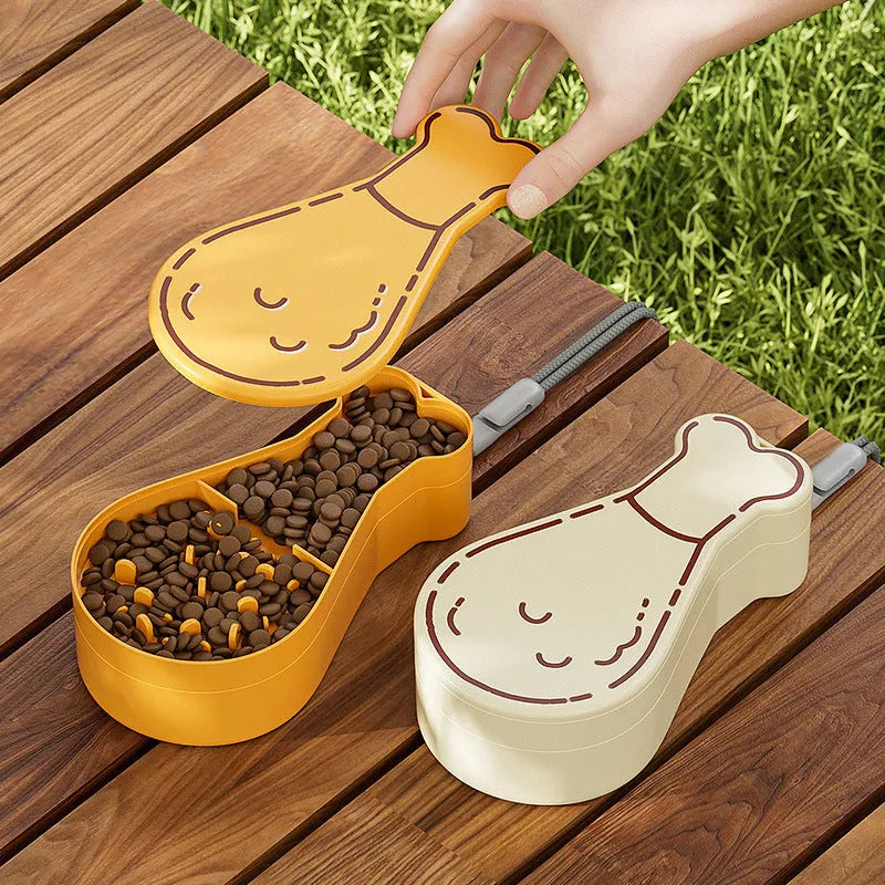 Orange and white portable pet water bottle with attached food container for travel