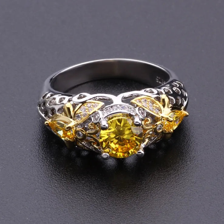 Geometric alloy ring with simulated zircon centre, available in sizes 6-10