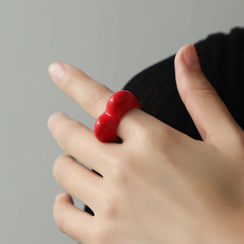 Zinc alloy heart-shaped ring with raised three-dimensional enamel colour detailing in love motif design