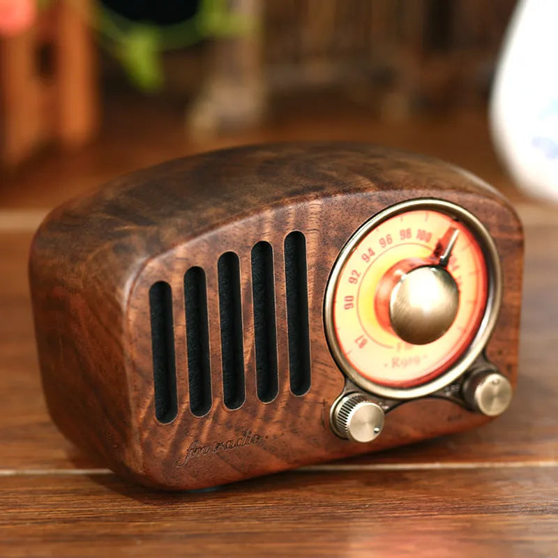 Retro wooden wireless mini speaker in cherry wood finish showing compact dimensions