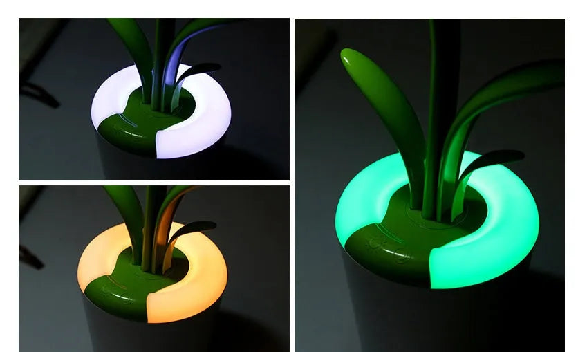 Modern rechargeable LED table lamp in blue with stylised plant shape on end table