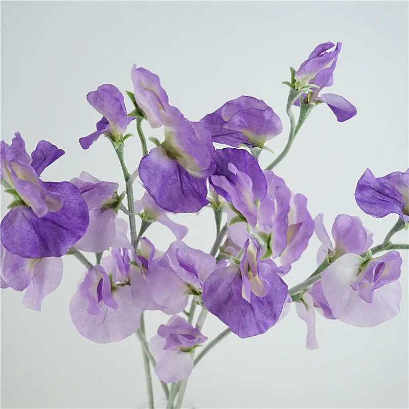 Single stem artificial silk pea flower in four colour options: pink, light purple, purplish red, white