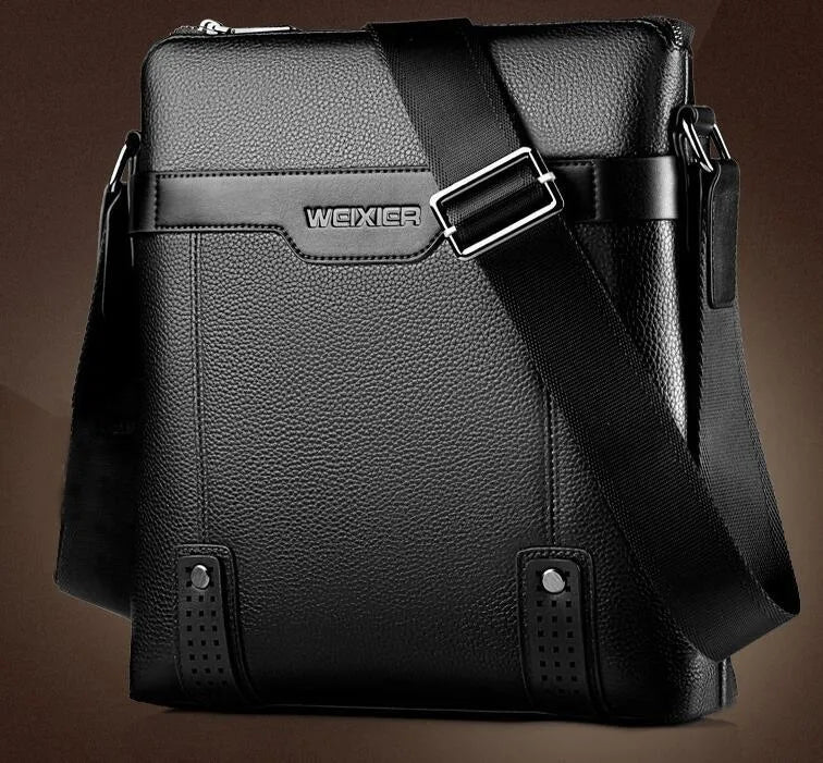 Men's PU leather messenger bag in black with zipper closure, soft body, and crossbody strap.