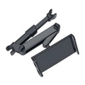 Black universal car phone holder mounted on rear seat centre armrest with tablet secured in snap-in mount
