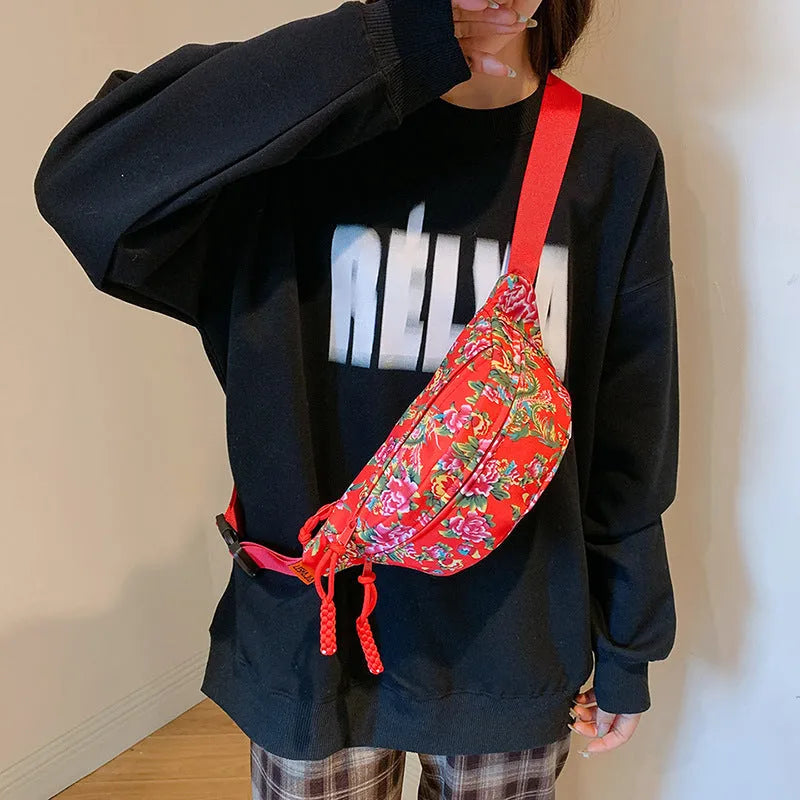 Women's floral Western style waist bag with three-dimensional pocket in black, red, green or blue colour options