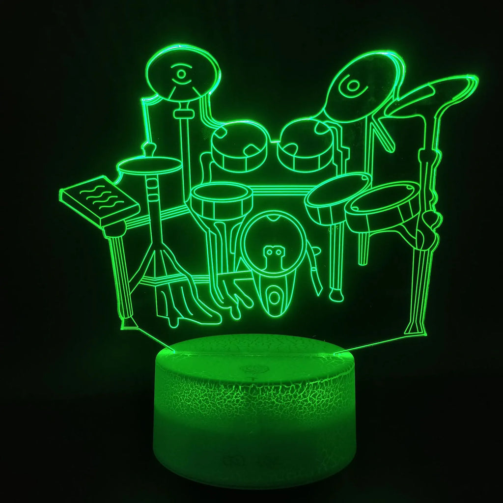 Drum kit 3D night light with seven colour modes, acrylic board, and ABS base on a desk