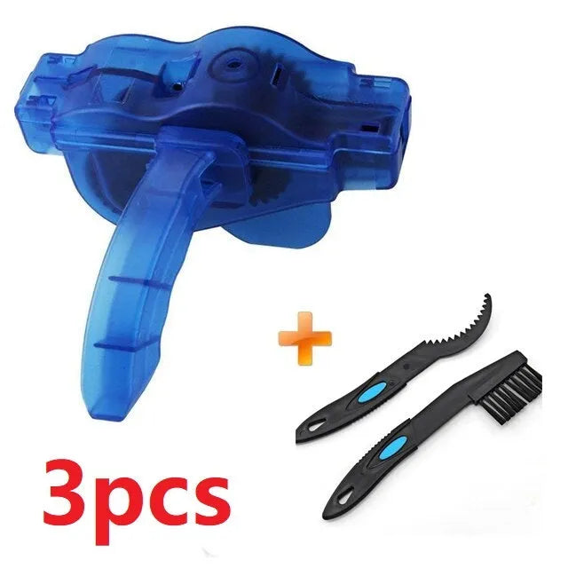 Blue plastic bicycle chain cleaning washer set with brushes on a bike chain