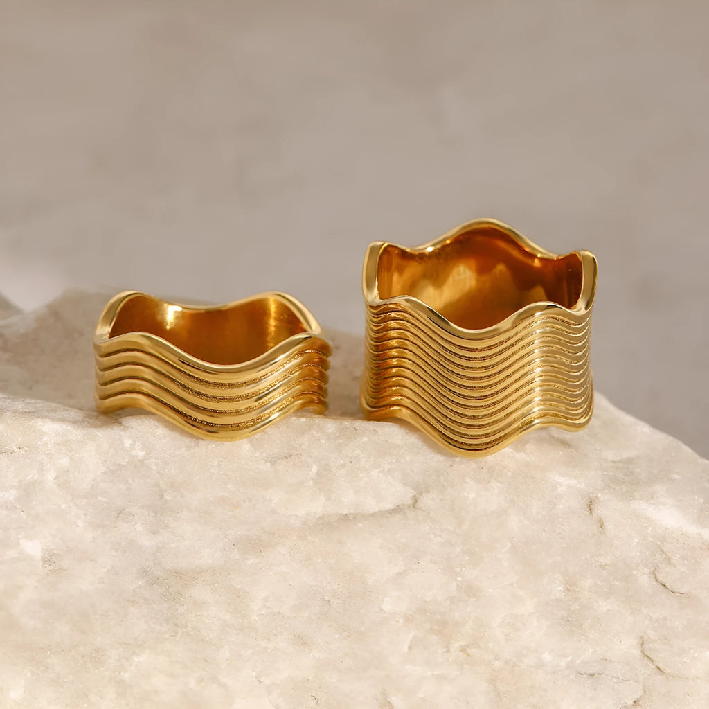 Stainless steel geometric wave pattern ring with wide band and electroplated finish