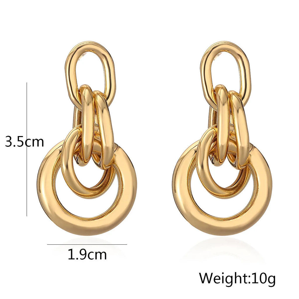 Women's geometric copper earrings with gold colour finish and irregular shapes