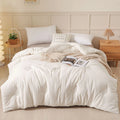 Soybean fibre quilt with pure cotton cover in white, pink jade, or grey, shown in various sizes.