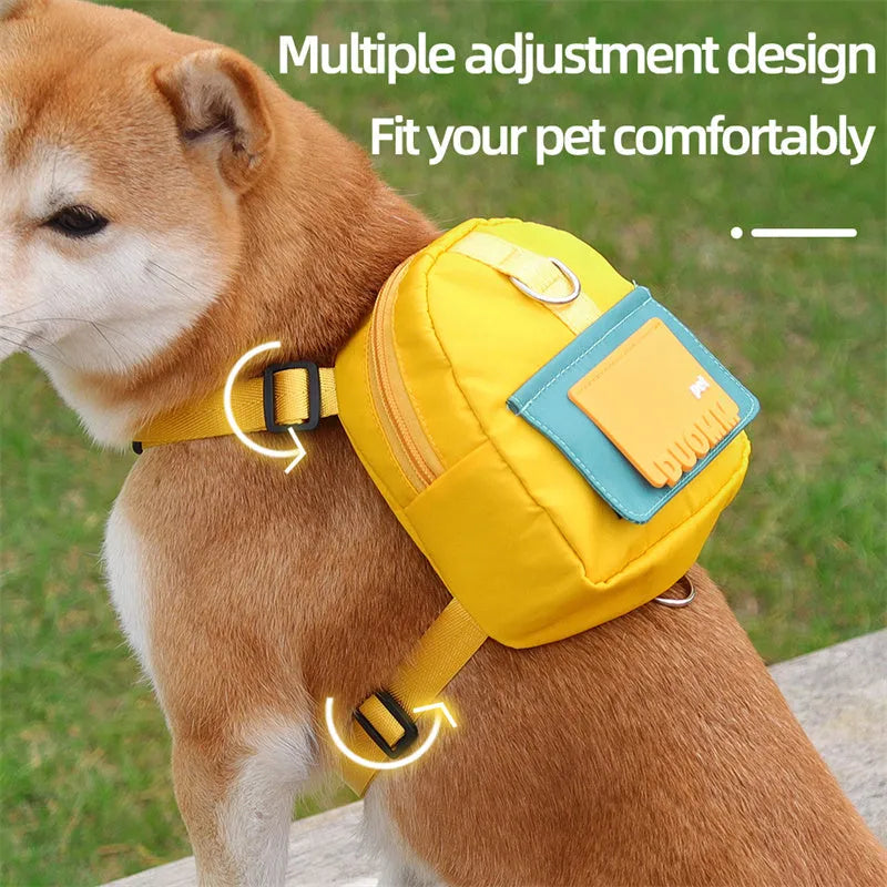 Blue multifunction dog backpack with adjustable harness, storage compartment, and attached tow rope on medium-sized dog