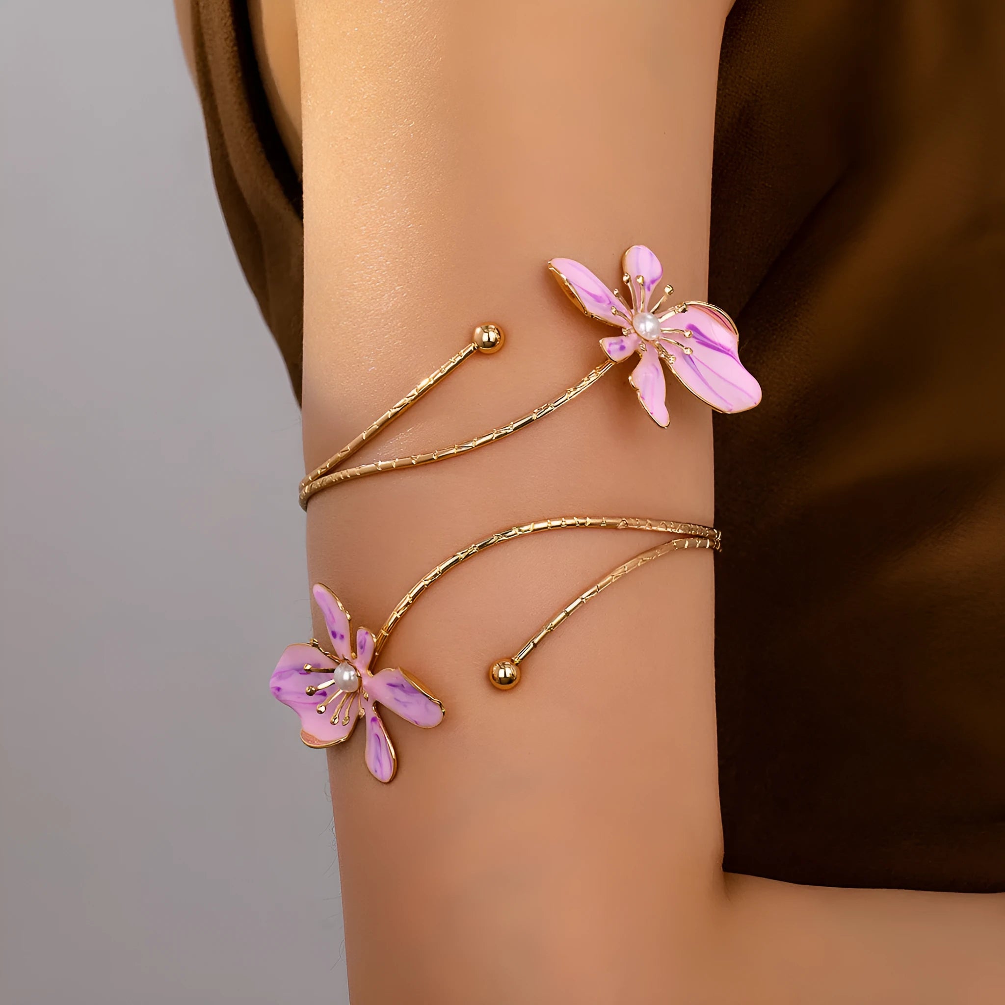 Alloy armband with hollow line pattern in pink or purple metallic finish
