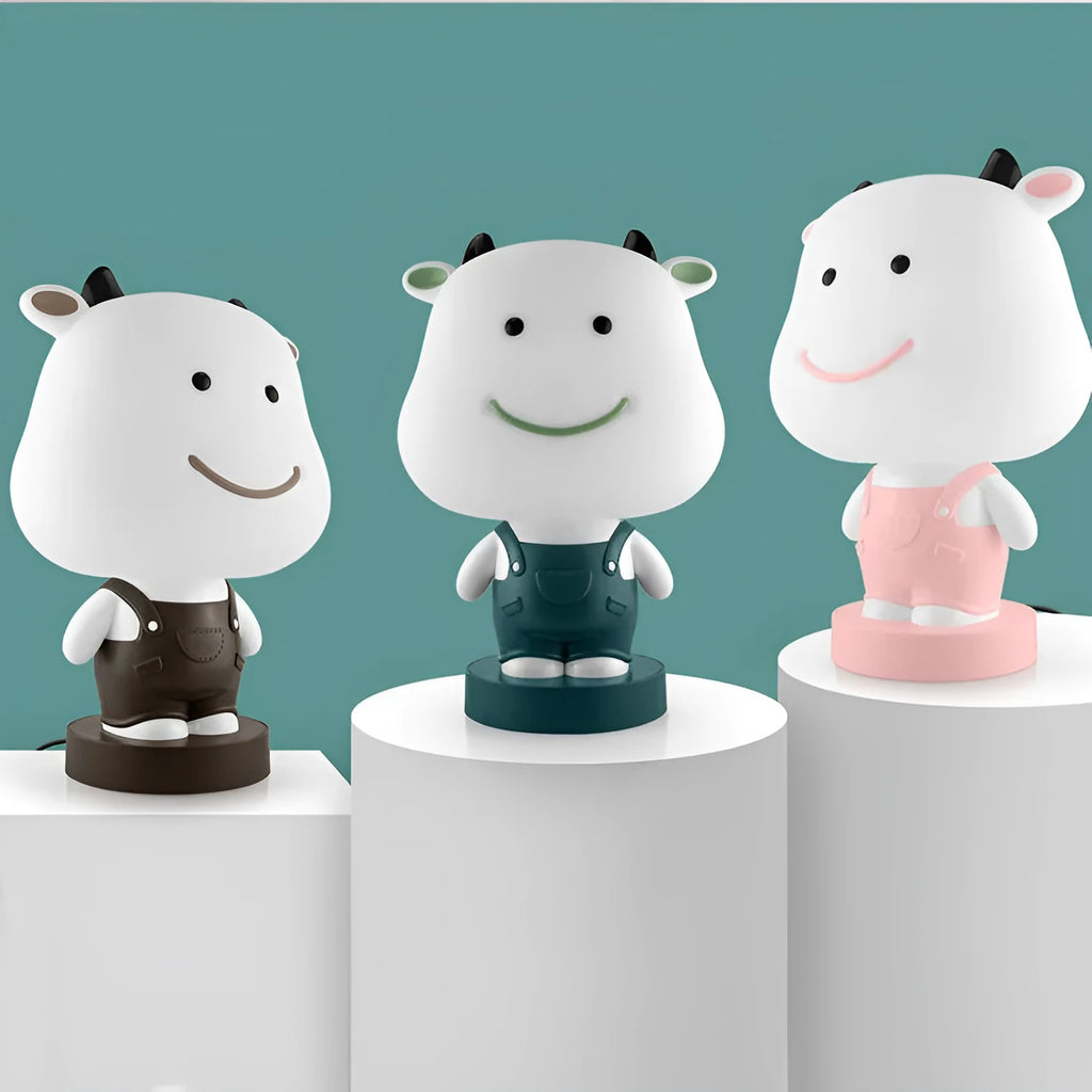Cartoon animal table lamp in Bear, Cattle, Rabbit or Tiger design with LED light and plastic shade.