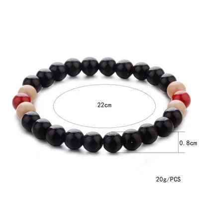 Natural lava stone essential oil diffuser bracelet with ethnic beads measuring 18cm