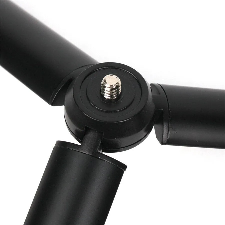 Black aluminium alloy mobile phone tripod and handheld stabiliser compatible with Apple iPhone