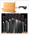 Eight-piece kitchen knife set with Damascus steel chef's knife and various blade sizes for food preparation