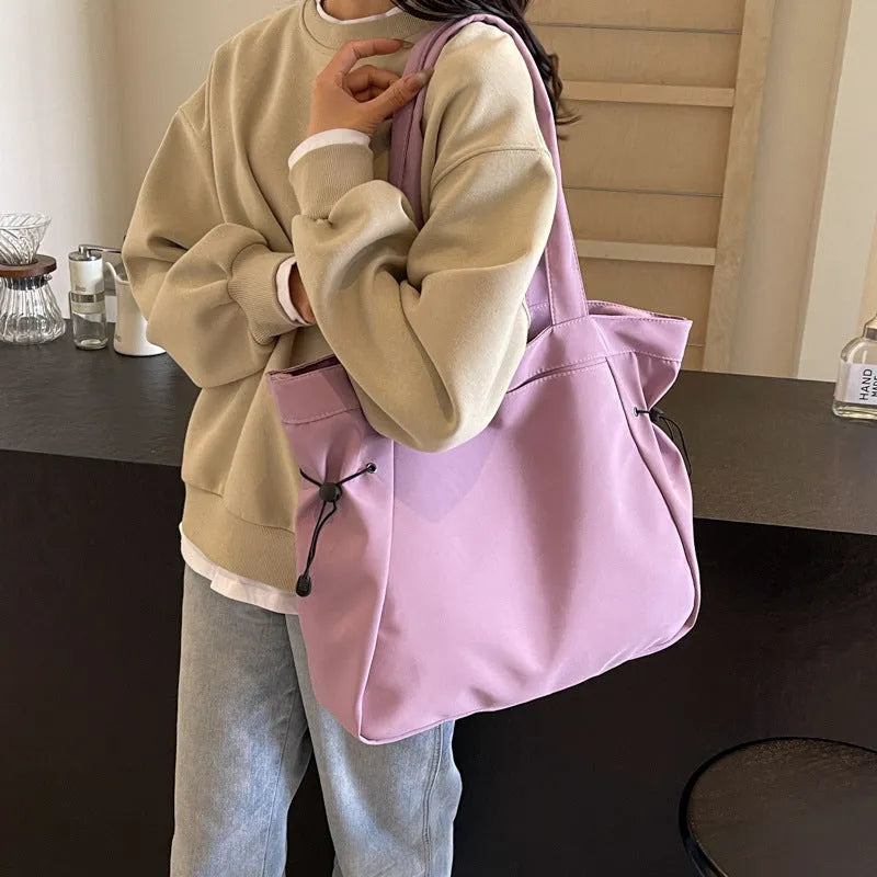 Soft Oxford cloth commuter shoulder tote bag in multiple colours with folding street trend design