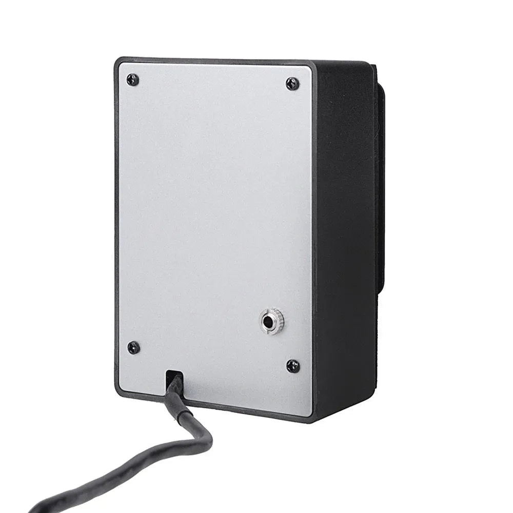 Cherub GT-6 black acoustic guitar preamp with EQ and effects knobs mounted in a guitar soundhole.