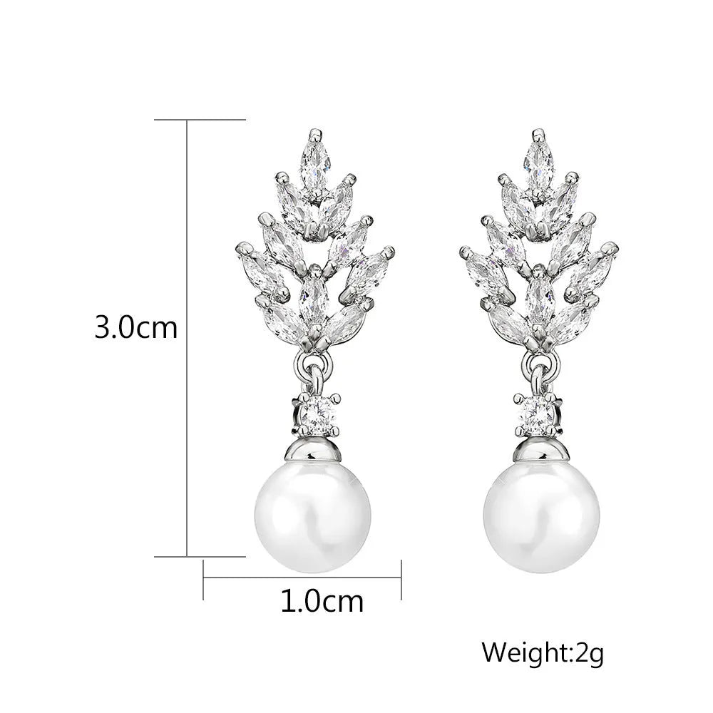Geometric floral design earrings with micro inlaid zircon detail in gold, platinum, or rose gold plating.